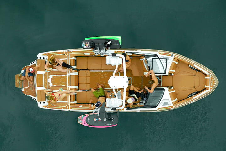 An overhead photo of the interior of the All-New 2025 Malibu Wakesetter 25 LSV with friends enjoying their day on the water