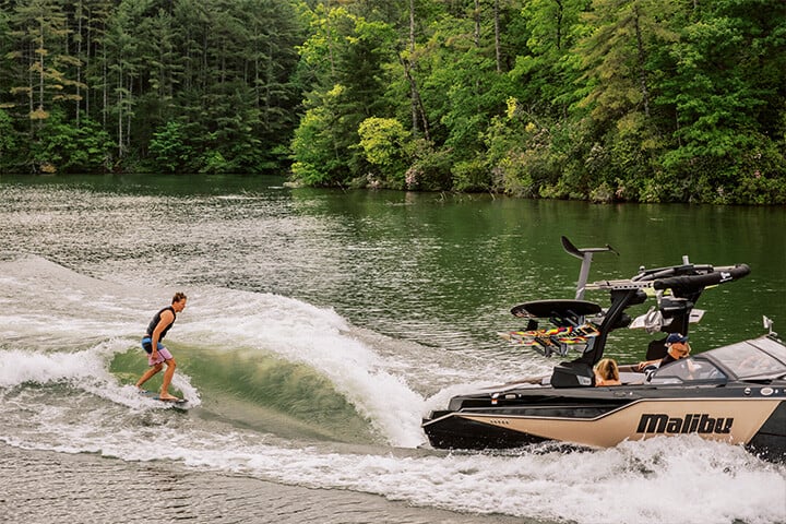Wakesurfing behind the 2025 Malibu M242 Wakesurfing behind the 2025 Malibu M242